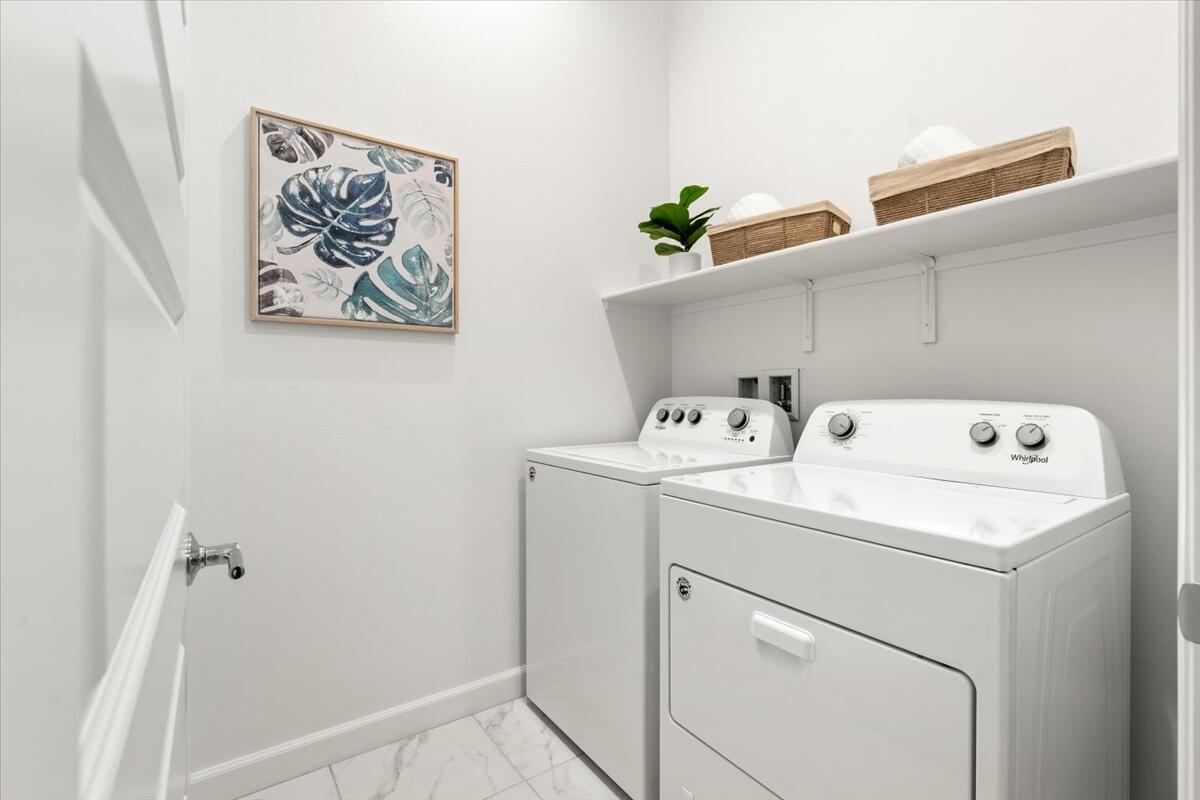 10 Gamay Rancho Mirage, CA 92270 - Photo 33 of 86 a utility room with dryer and washer