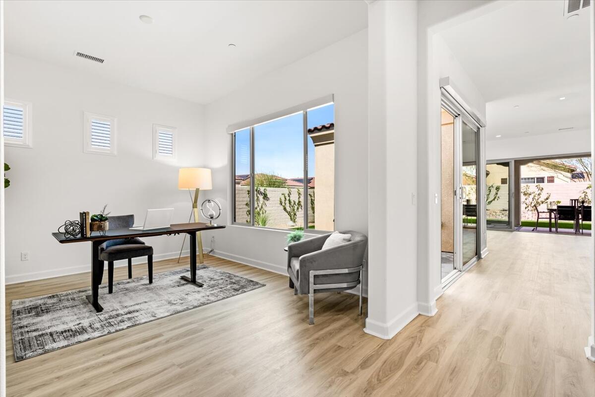 10 Gamay Rancho Mirage, CA 92270 - Photo 4 of 86 a view of a livingroom with furniture and wooden floor