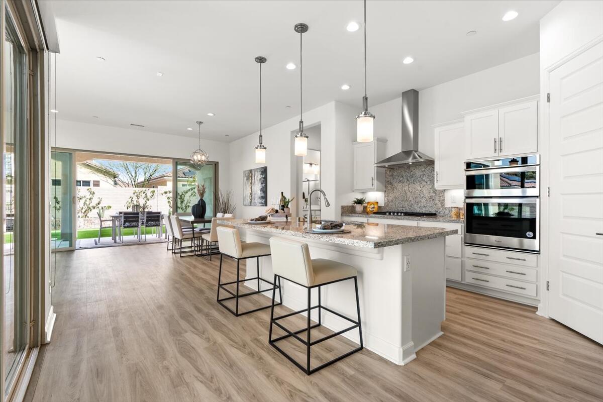 10 Gamay Rancho Mirage, CA 92270 - Photo 6 of 86 a kitchen with stainless steel appliances kitchen island a large island in the center