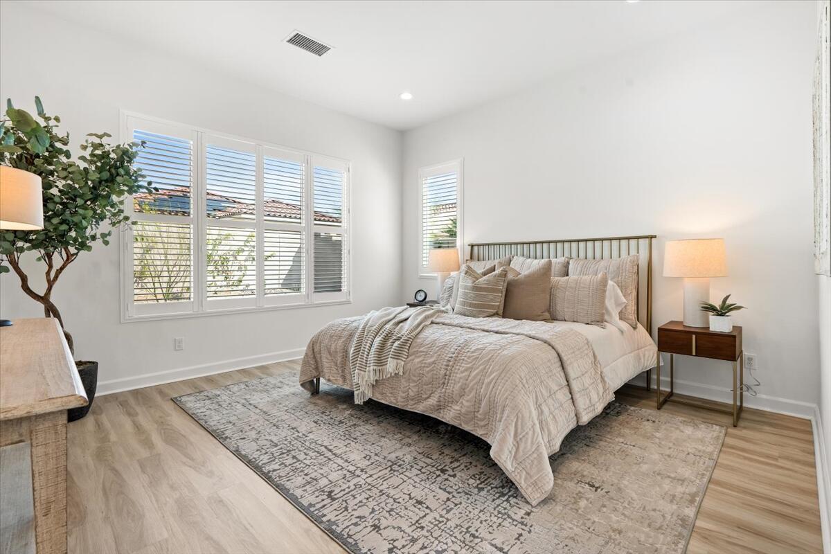 10 Gamay Rancho Mirage, CA 92270 - Photo 10 of 86 a bed sitting in a spacious bedroom next to a window