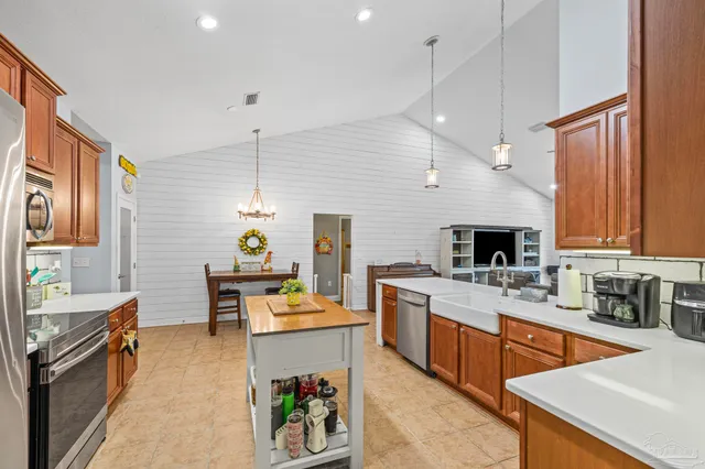 a kitchen with a stove and a microwave