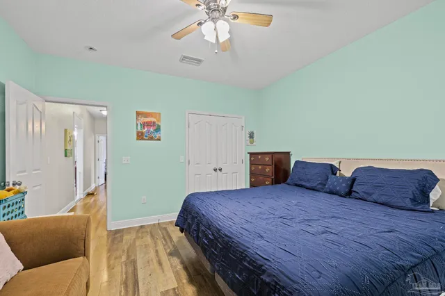 a swimming pool with outdoor seating yard and barbeque oven