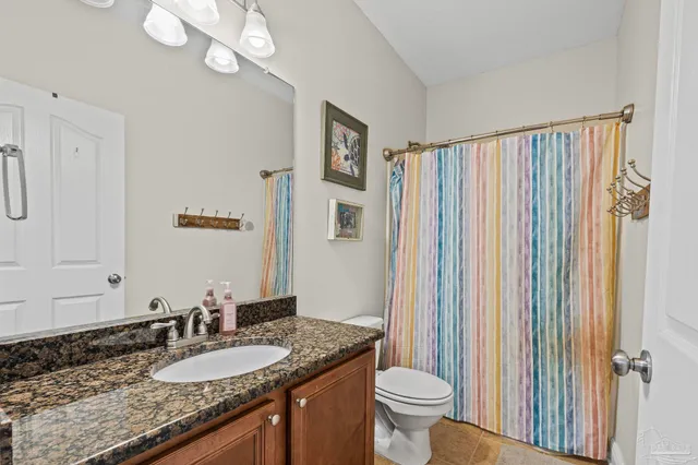 a view of a house with swimming pool and sitting area
