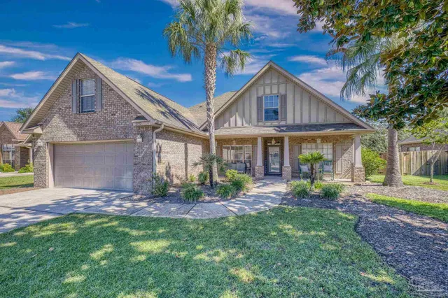a view of a house with patio outdoor seating area