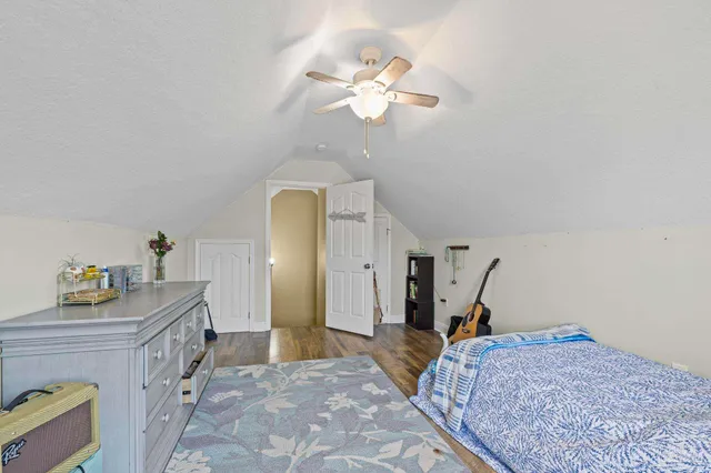 a view of a patio with a table and chairs
