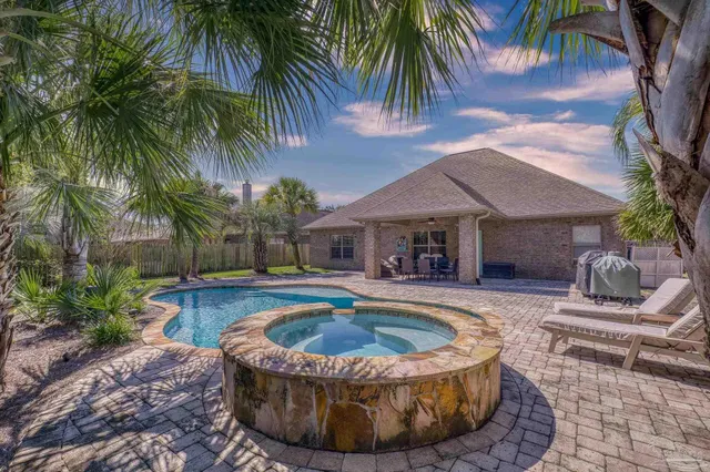 an aerial view of a house with a garden