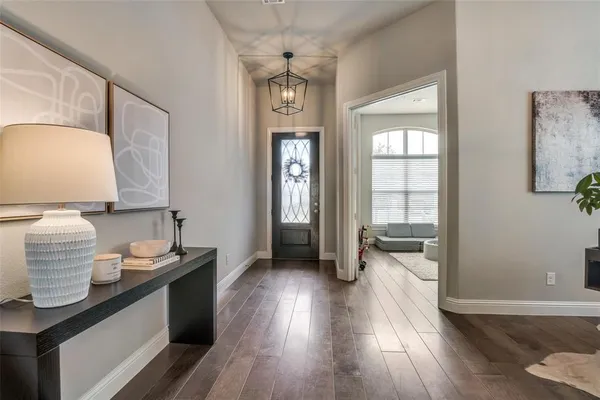 a kitchen with granite countertop a stove and a sink