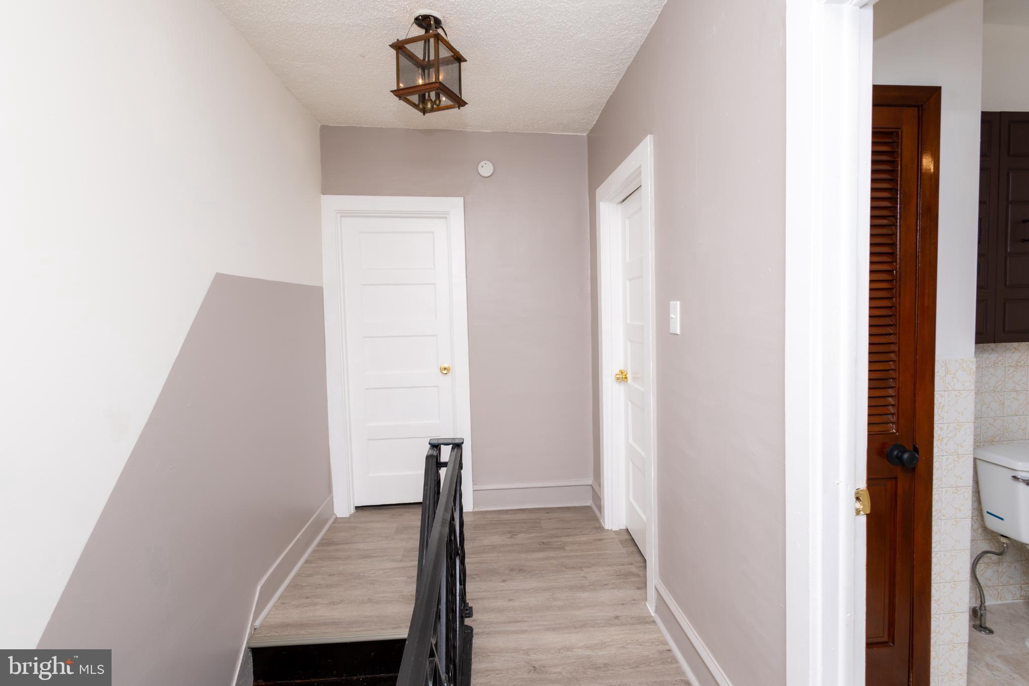 4243 Frost Street Philadelphia, PA 19136 - Photo 15 of 28 a view of a hallway with a room and stairs