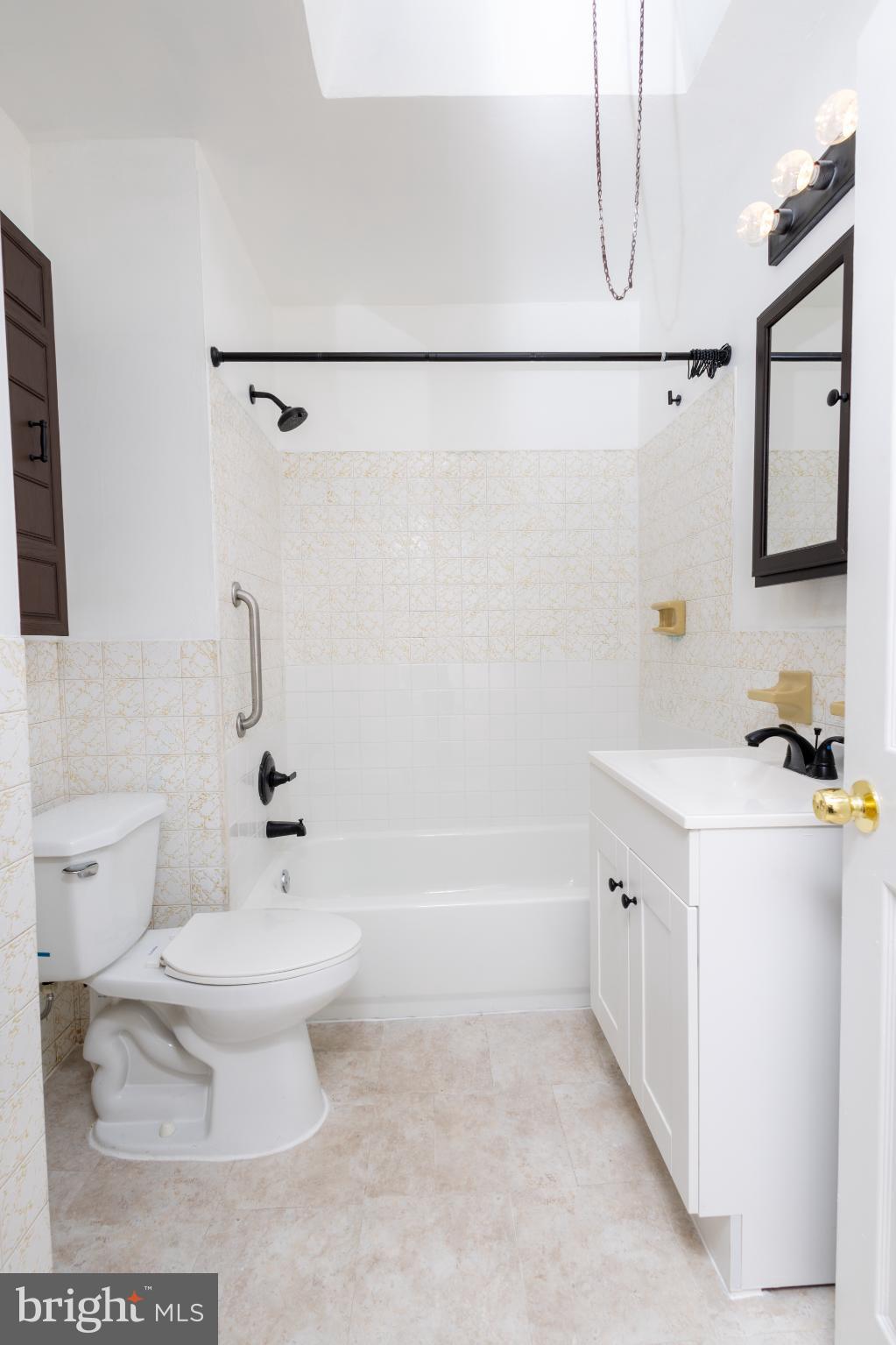 4243 Frost Street Philadelphia, PA 19136 - Photo 16 of 28 a bathroom with a sink a toilet and a bathtub