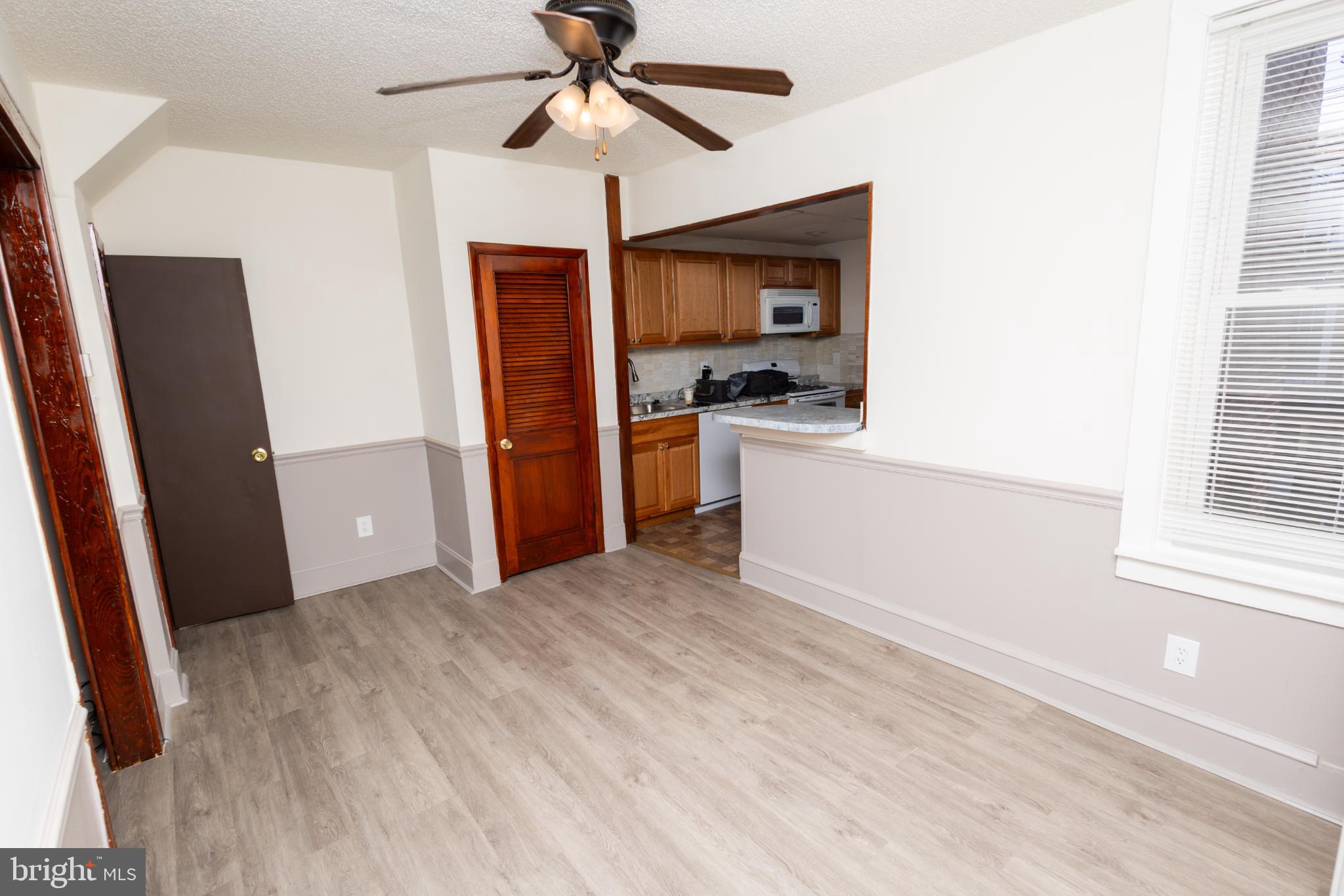 4243 Frost Street Philadelphia, PA 19136 - Photo 7 of 28 a view of a kitchen with a sink refrigerator and a window
