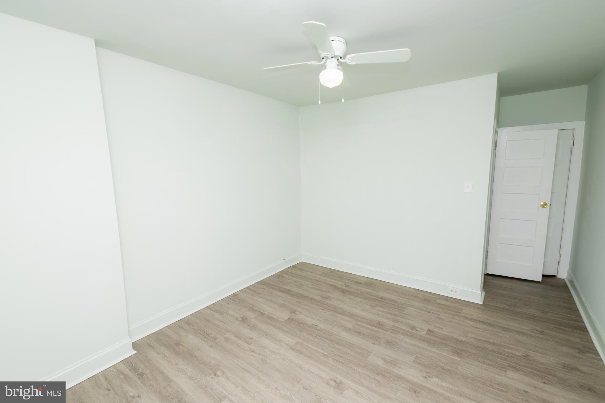 4243 Frost Street Philadelphia, PA 19136 - Photo 10 of 28 an empty room with wooden floor and window
