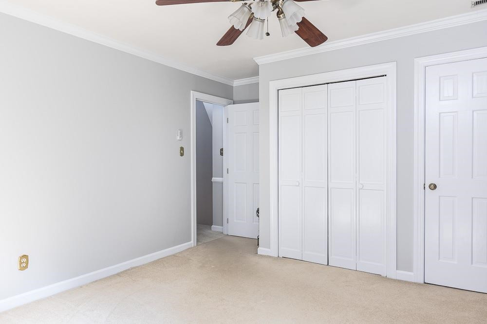 9513 Springdale Drive Raleigh, NC 27613 - Photo 18 of 30 2nd Bedroom with 2 Closets