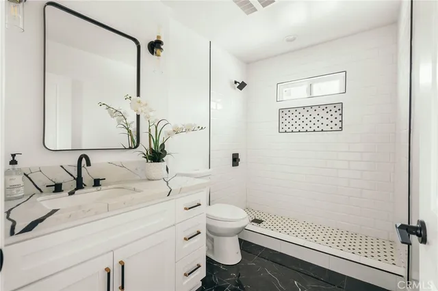 a front view of a house with a garage