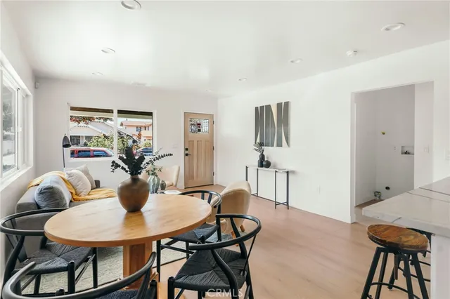 a kitchen with stainless steel appliances a stove sink and cabinets