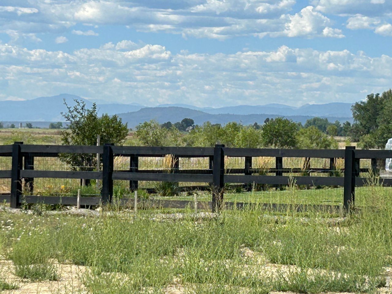 Unobstructed Mountain and Foothills view from the back of the lot