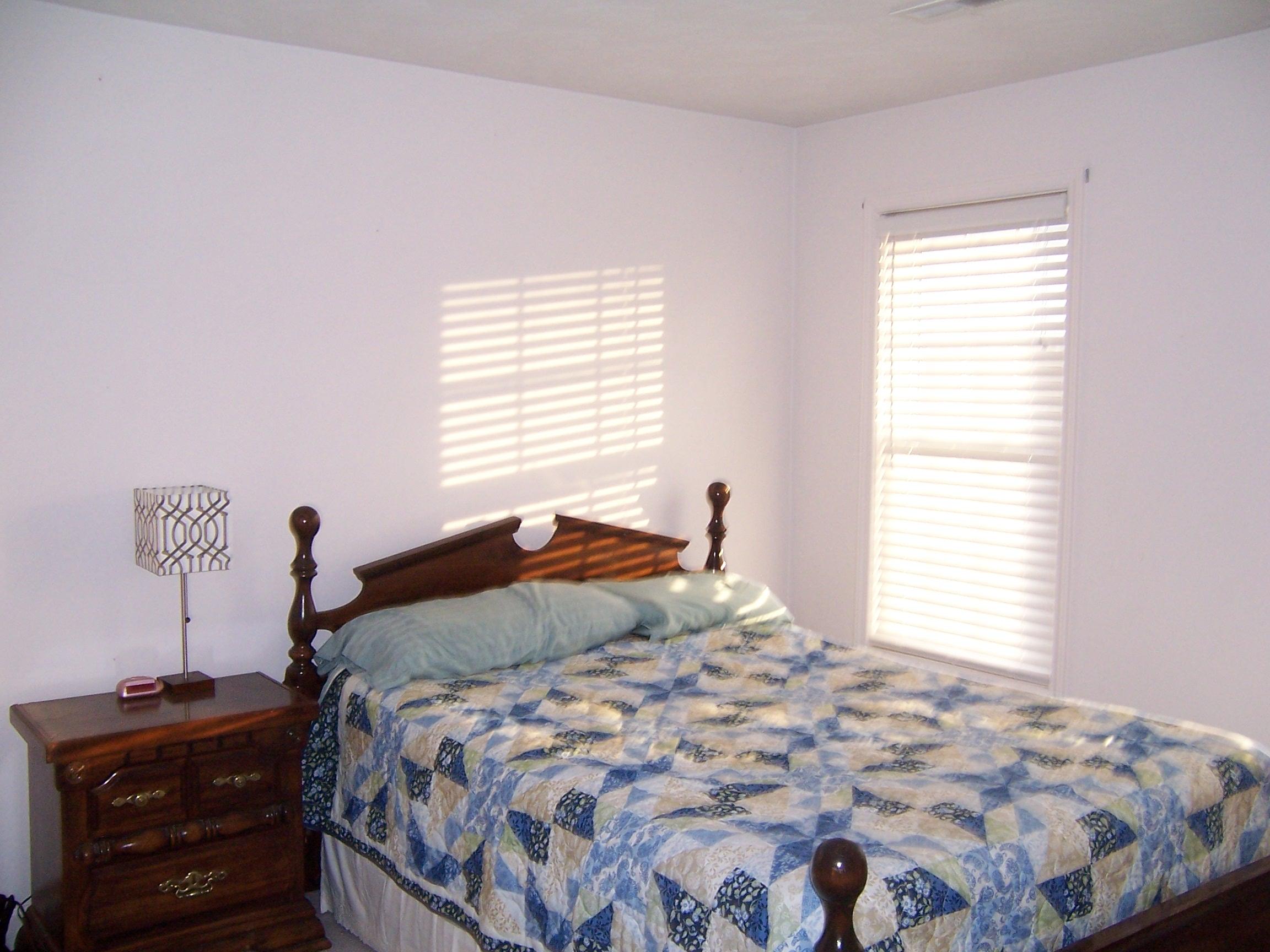 1700 Meadows Road Vinton, VA 24179 - Photo 17 of 27 a bedroom with a bed and a window