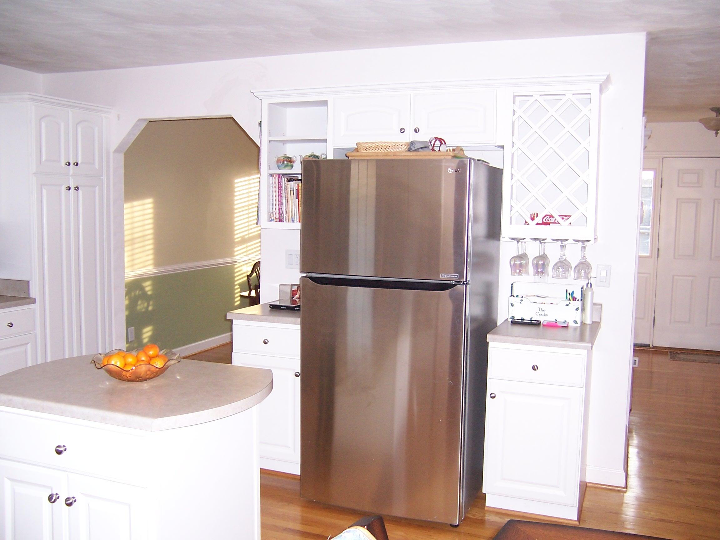 1700 Meadows Road Vinton, VA 24179 - Photo 4 of 27 a kitchen with a refrigerator and a stove