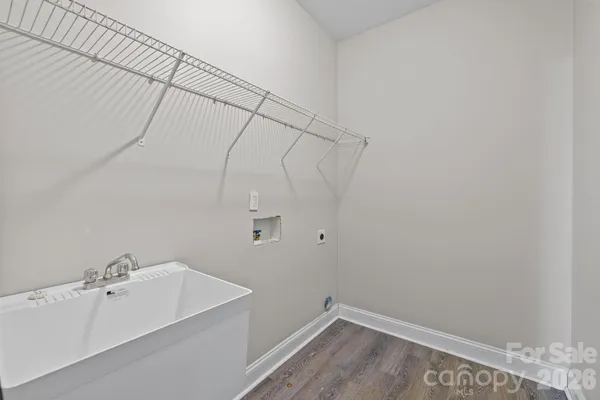 a bathroom with a sink and vanity