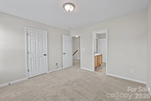 an empty room with a bathroom