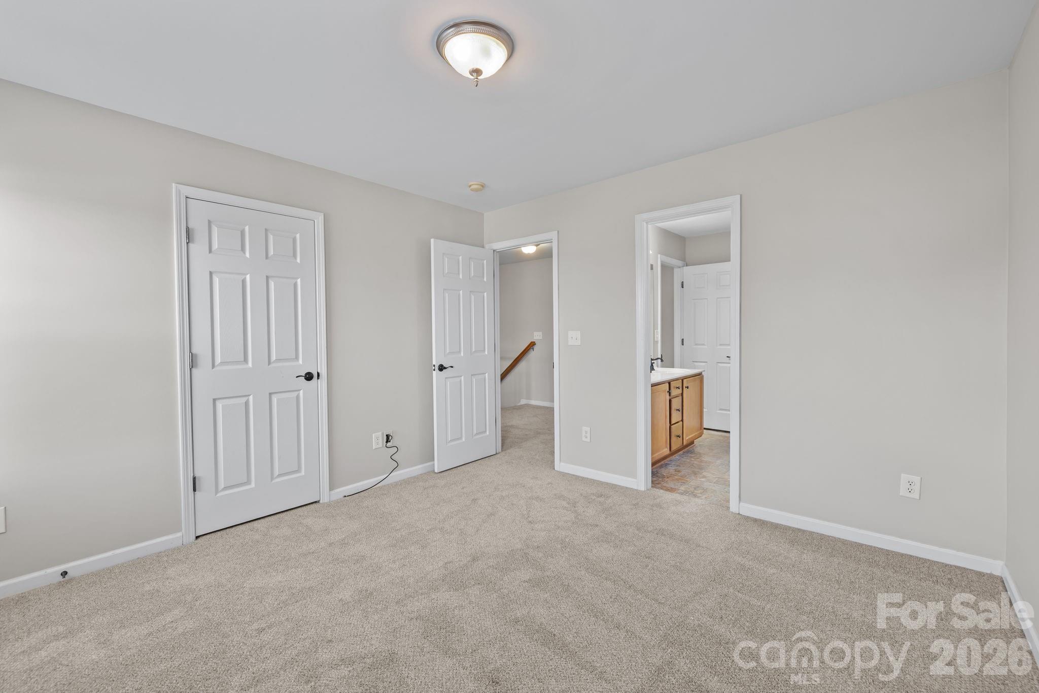 6226 Hermsley Road Charlotte, NC 28278 - Photo 23 of 47 an empty room with a bathroom