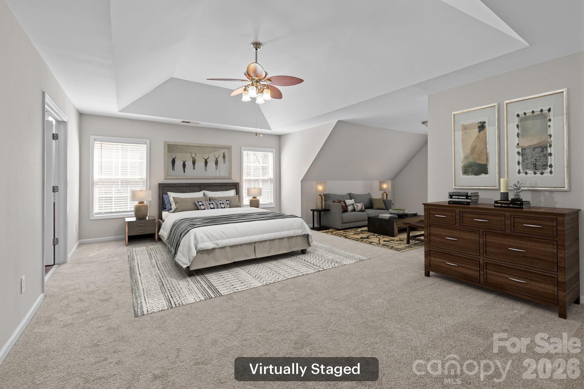 6226 Hermsley Road Charlotte, NC 28278 - Photo 29 of 47 a bedroom with a bed and ceiling fan
