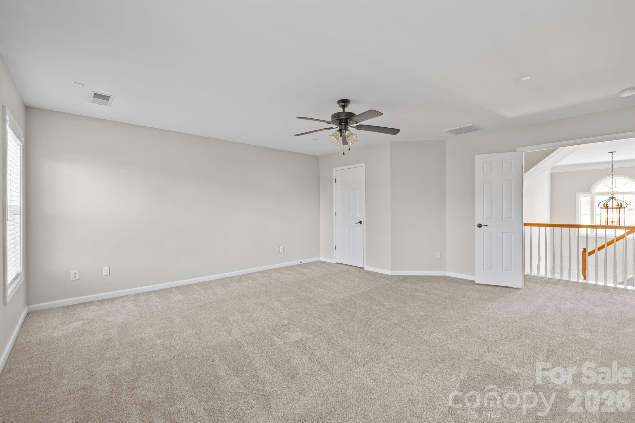 6226 Hermsley Road Charlotte, NC 28278 - Photo 36 of 47 a view of an empty room with a window