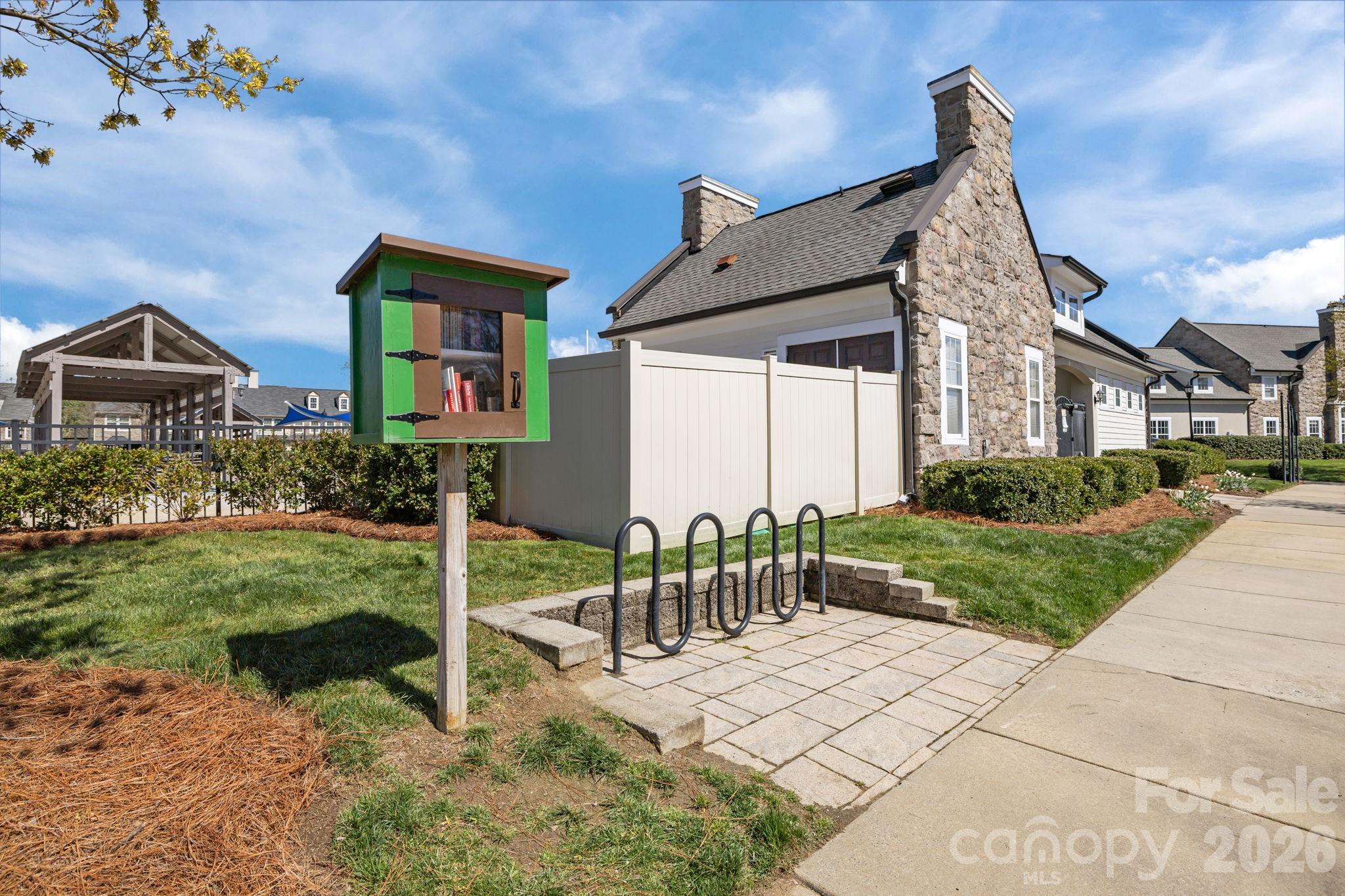 6226 Hermsley Road Charlotte, NC 28278 - Photo 45 of 47 a front view of a house with a garden