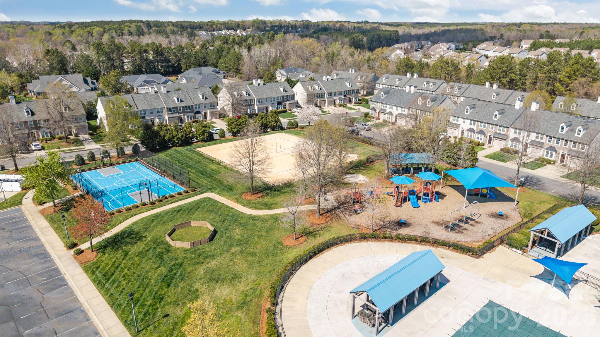 6226 Hermsley Road Charlotte, NC 28278 - Photo 47 of 47 an aerial view of a house with a swimming pool