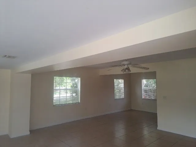 an empty room with windows