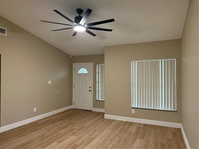 a view of a livingroom with a furniture and fireplace