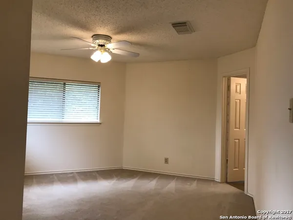 a bathroom with a tub and a shower