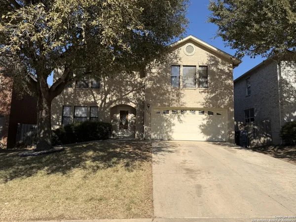 a view of a outdoor space in front of a house