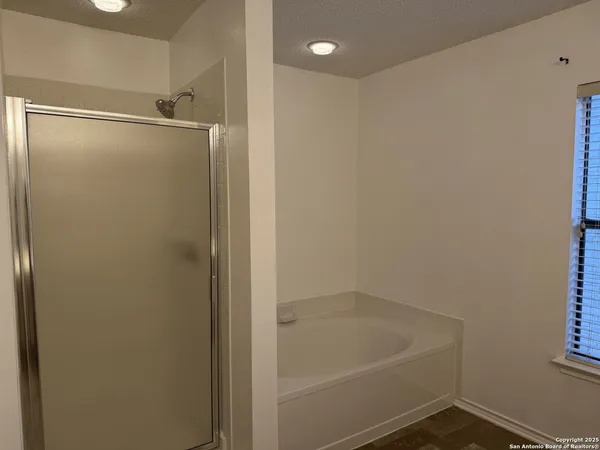 a bathroom with a sink and a bathtub