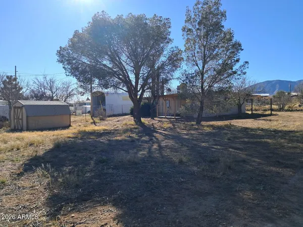 a view of a houses with a yard