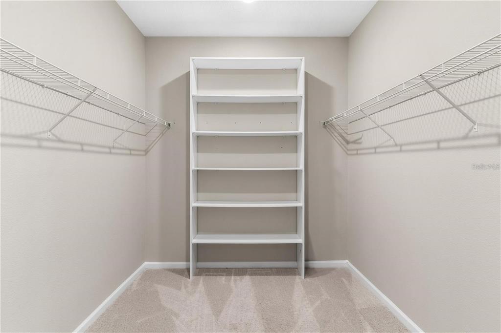6003 Nightjar Court Leesburg, FL 34748 - Photo 12 of 41 a view of an empty walk in closet