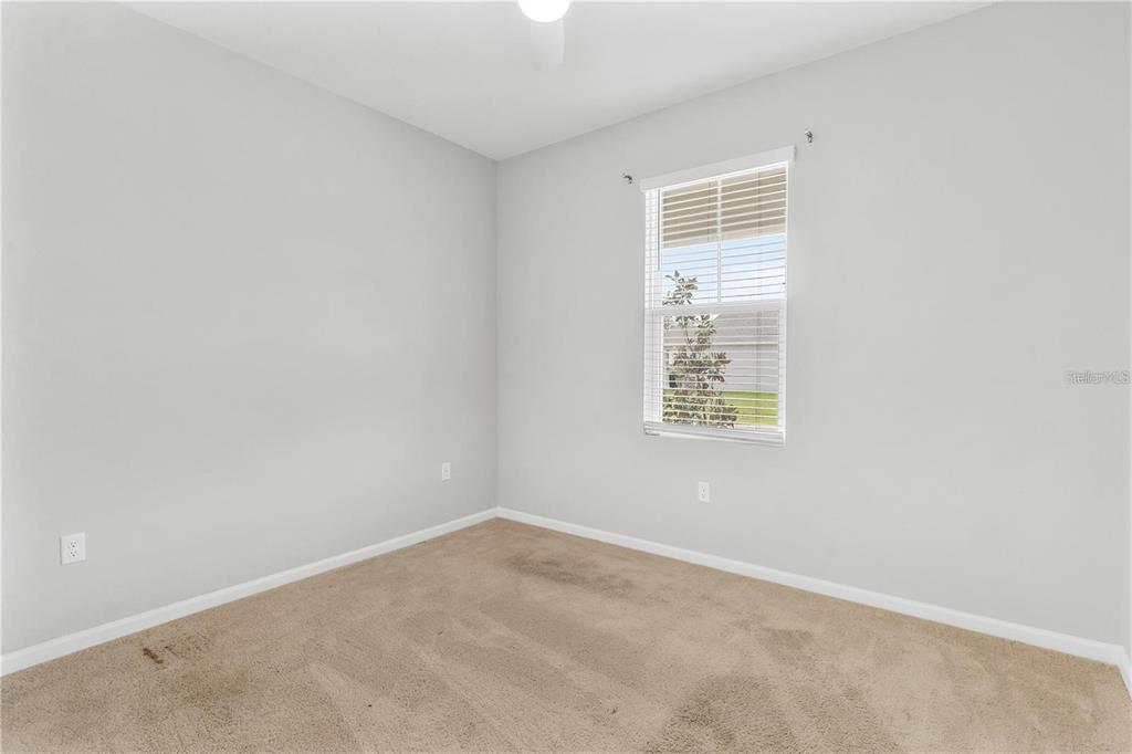 6003 Nightjar Court Leesburg, FL 34748 - Photo 29 of 41 an empty room with a window