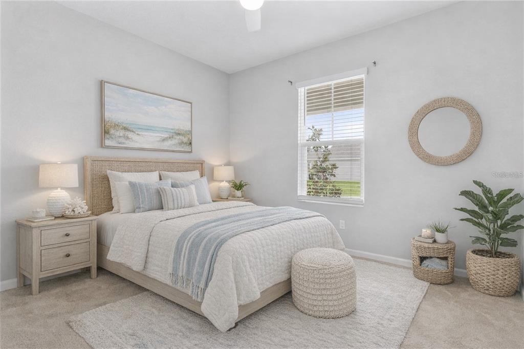 6003 Nightjar Court Leesburg, FL 34748 - Photo 36 of 41 a bedroom with a bed and window