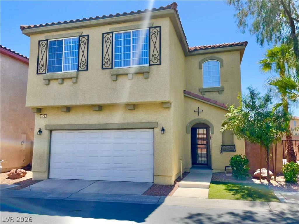 679 Baffin Island Road Henderson, NV 89011 - Photo 1 of 1 A well-maintained stucco home with a garage and a private entryway.
