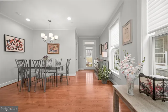 a spacious bedroom with a bed and cabinet