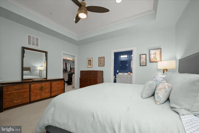 a bathroom with a double vanity sink toilet and shower