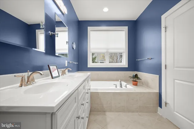 a bathroom with a sink and a bathtub