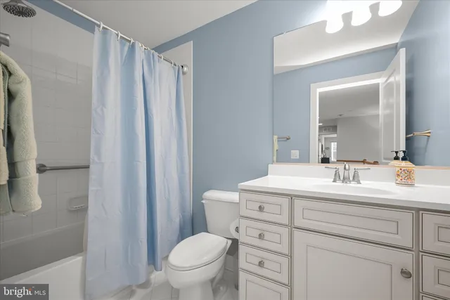 wooden floor in kitchen and a livingroom with furniture