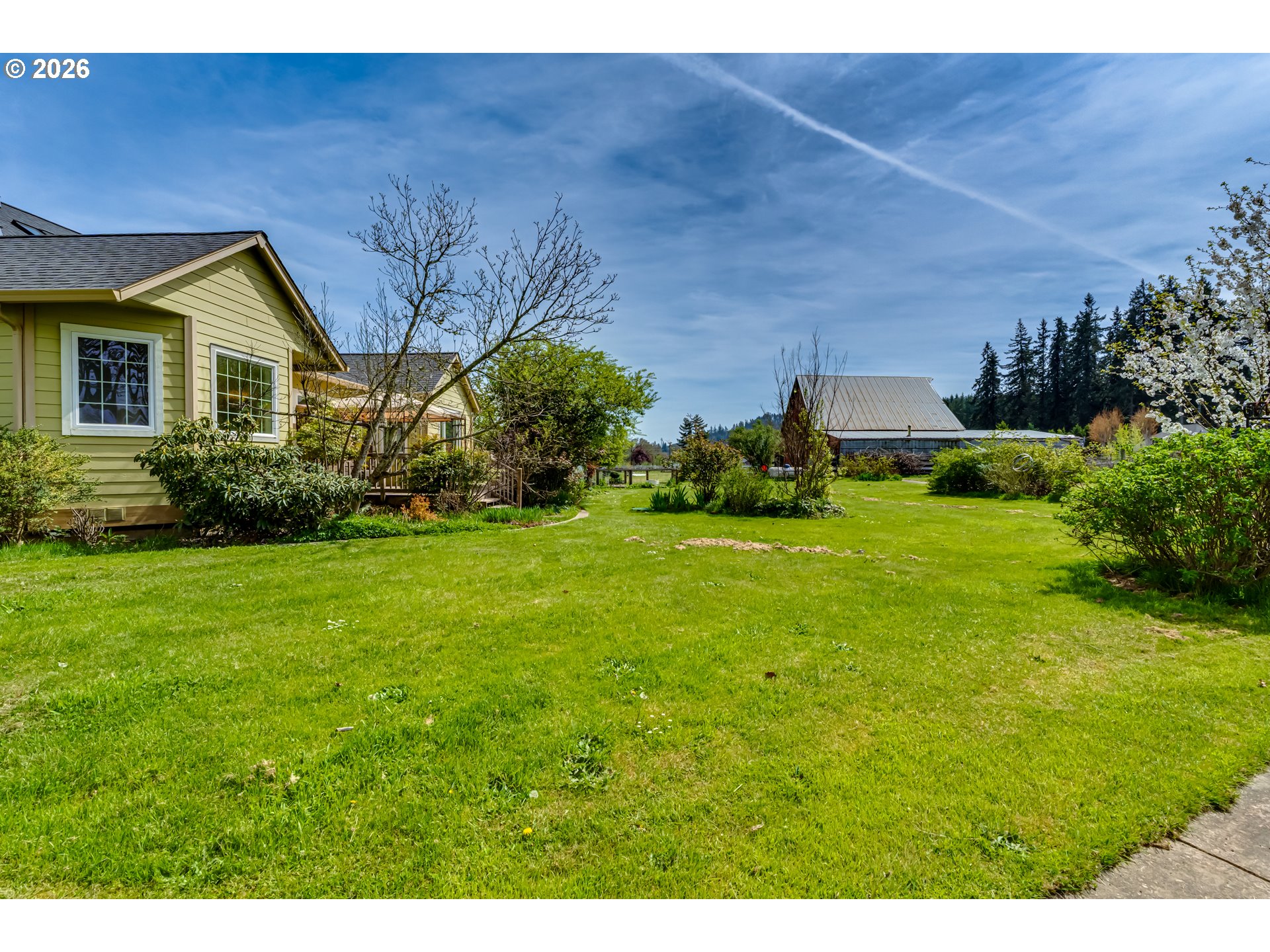 34386 Mathews Road Eugene, OR 97405 - Photo 18 of 48 a view of a house with a big yard