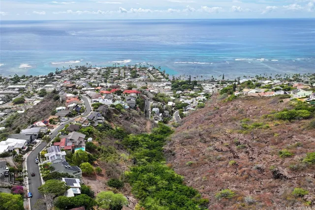 a view of a city with an ocean