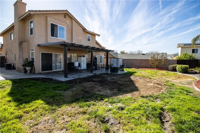 a view of a house with a swimming pool