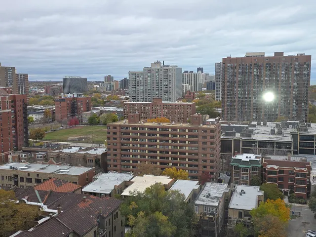 a view of a city with tall buildings