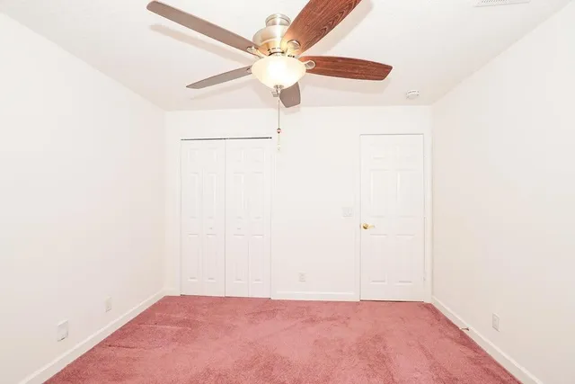 a bathroom with a sink a mirror a bathtub and shower
