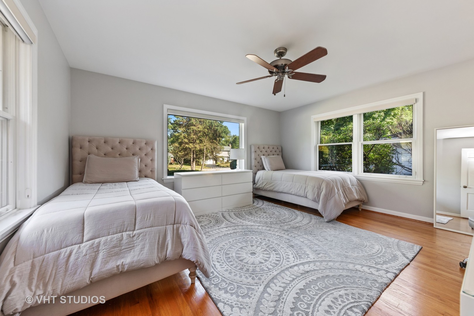 1108 Woodview Road Burr Ridge, IL 60527 - Photo 14 of 29 a bedroom with a large bed and a window