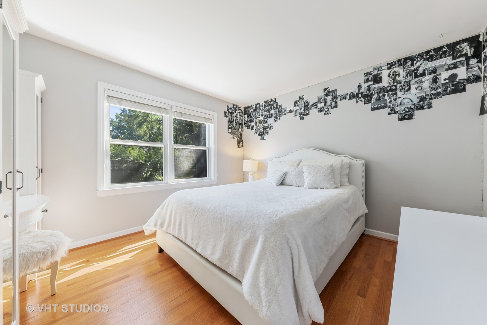 1108 Woodview Road Burr Ridge, IL 60527 - Photo 17 of 29 a bedroom with a bed and a window