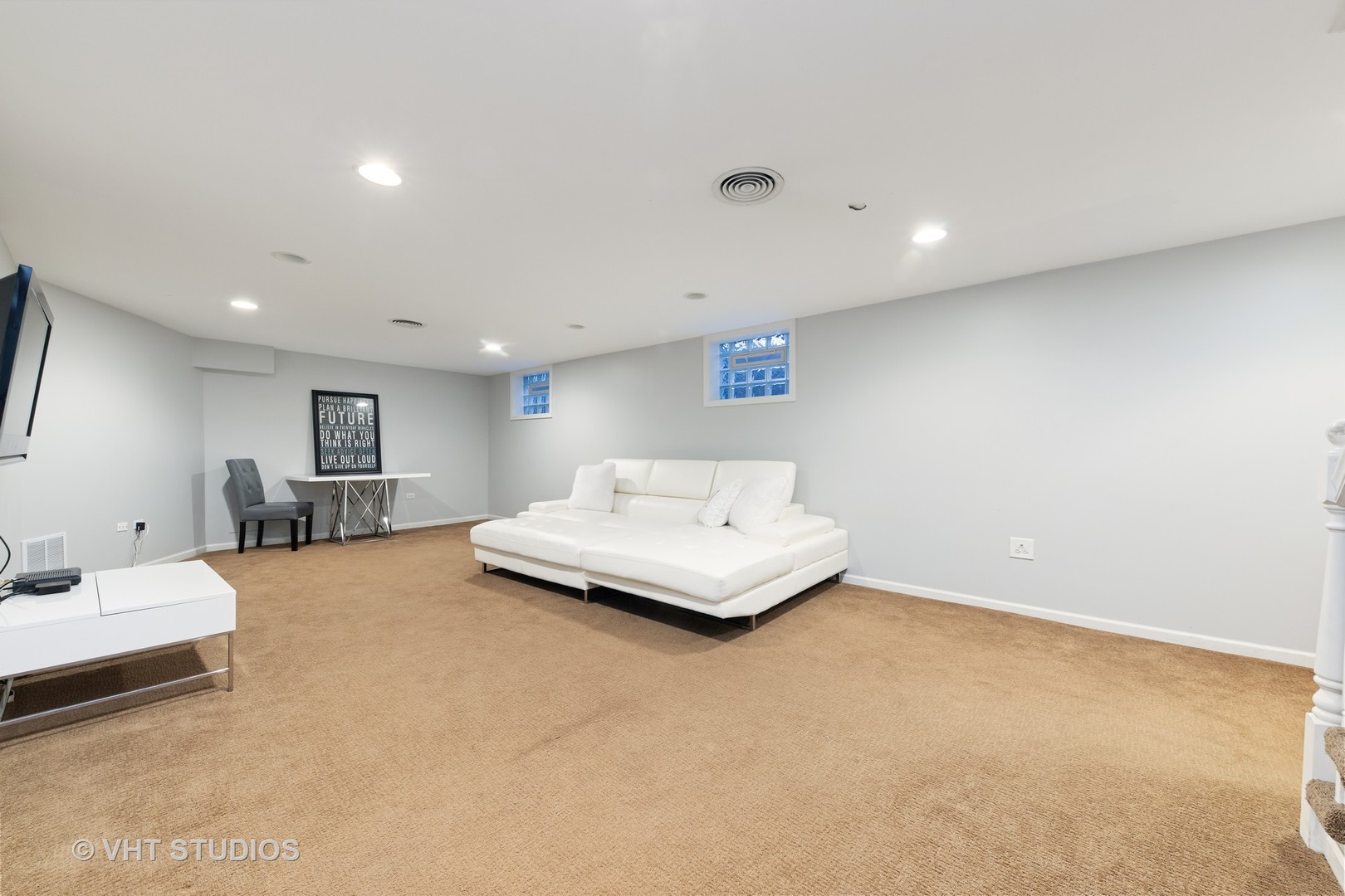 1108 Woodview Road Burr Ridge, IL 60527 - Photo 20 of 29 a living room with furniture and a table